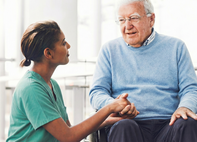 Caregiver providing dementia home care to an older adult in Point Loma